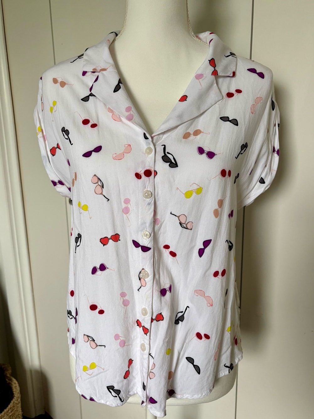Cooper & Ella White Sleeveless Button-Up Top with Multi-Color Sunglasses Print